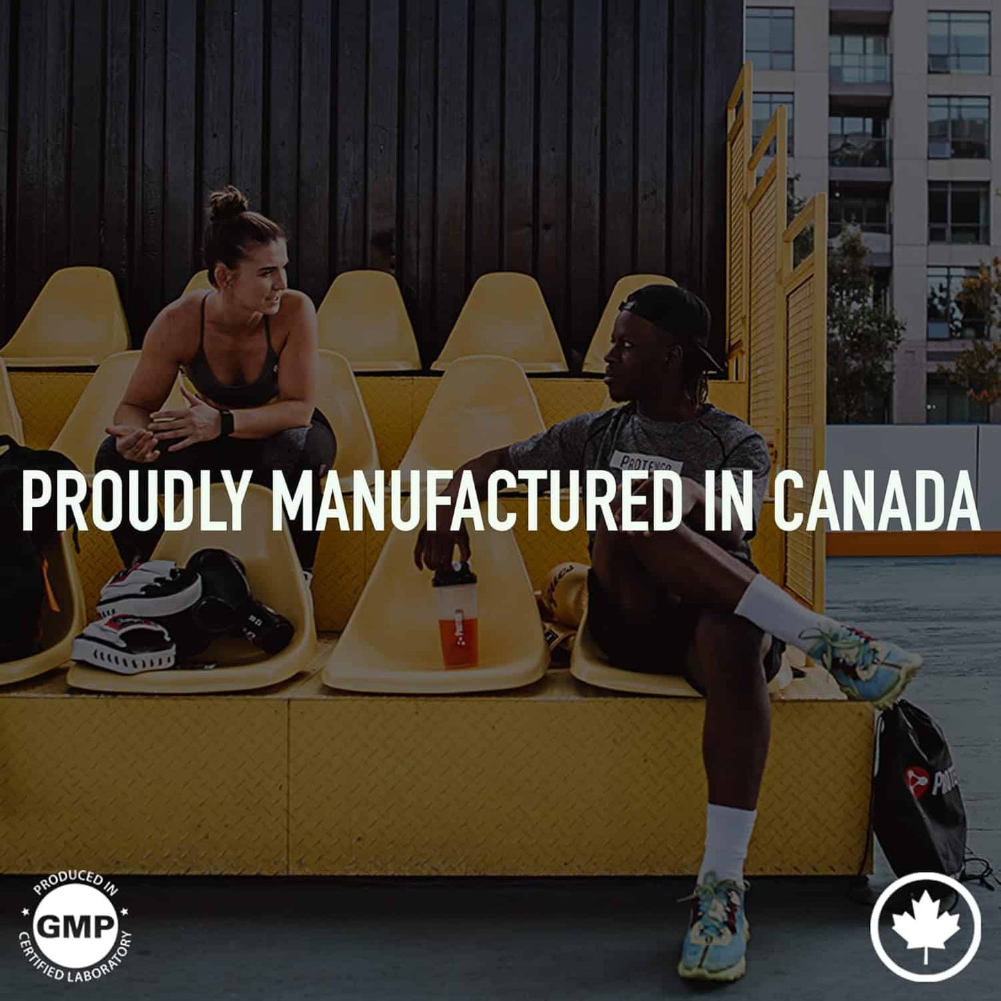 Two people sitting on yellow chairs with text 'Proudly Manufactured in Canada' and logos.