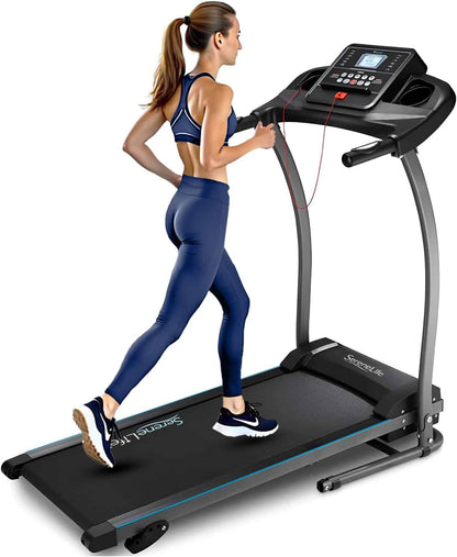 Woman using a treadmill with a white background