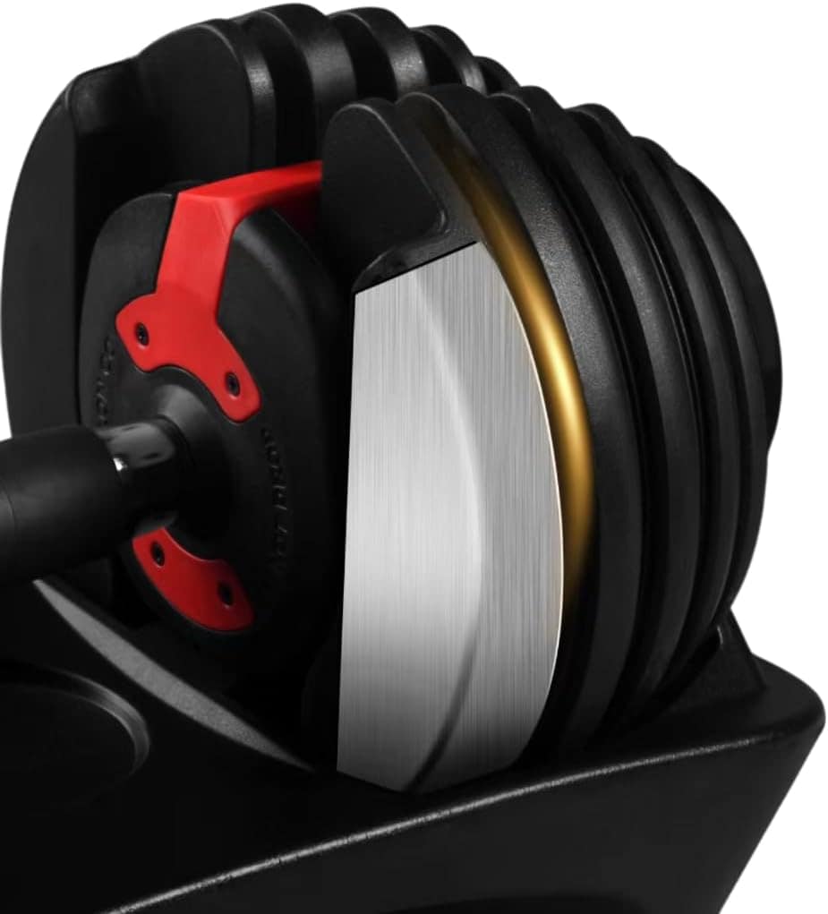 Close-up of a fishing reel with black, red, and silver components on a white background