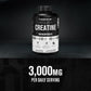 Creatine monohydrate supplement bottle with label on a black background