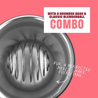 Close-up of a blender container with text on a pink background