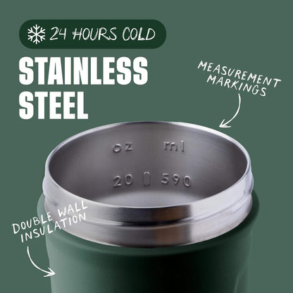 Stainless steel travel mug with measurement markings on a green background