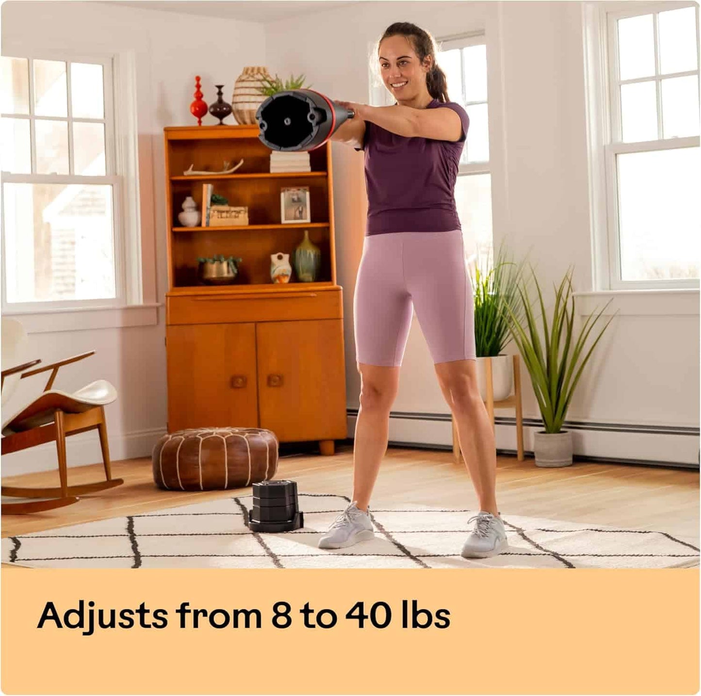 Woman exercising with a resistance band in a home setting