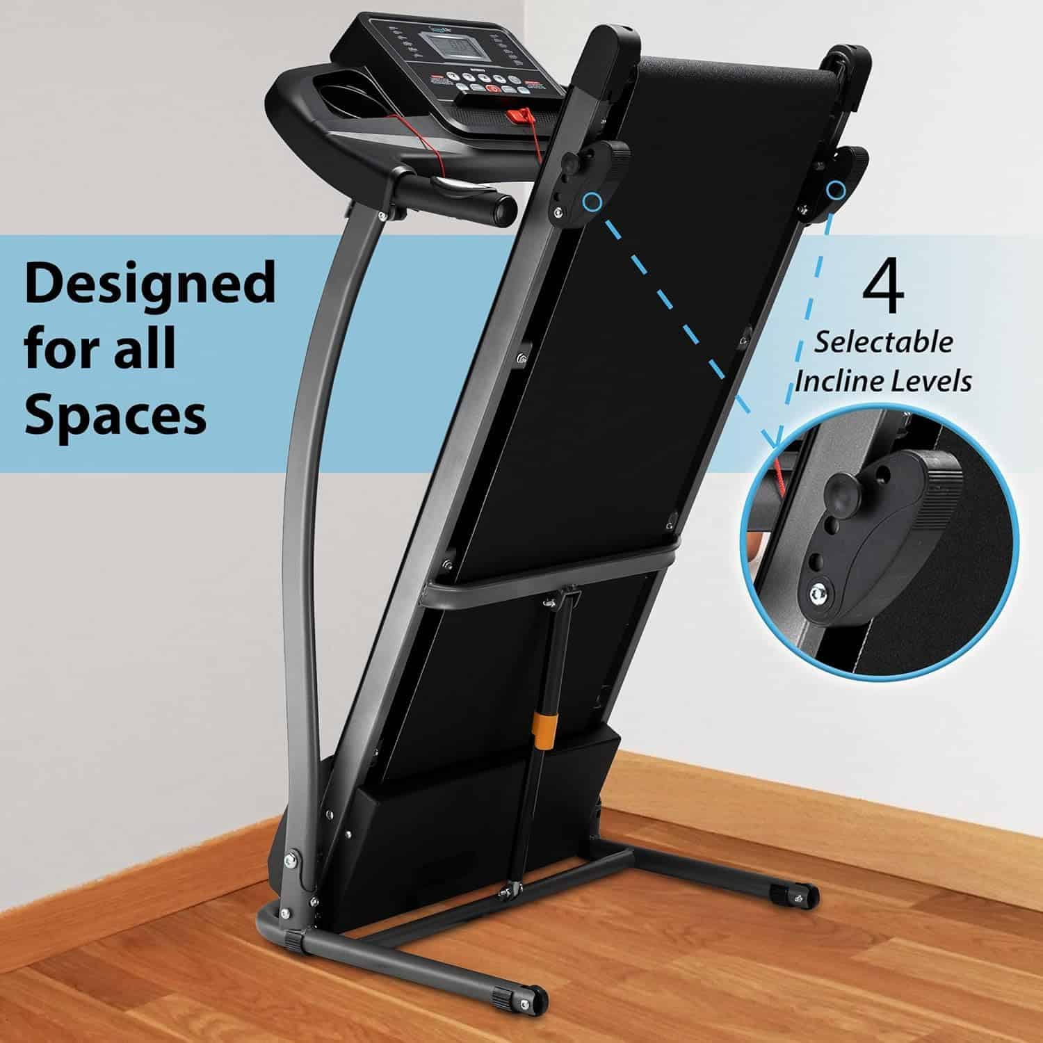 Foldable treadmill with adjustable incline levels on a wooden floor.