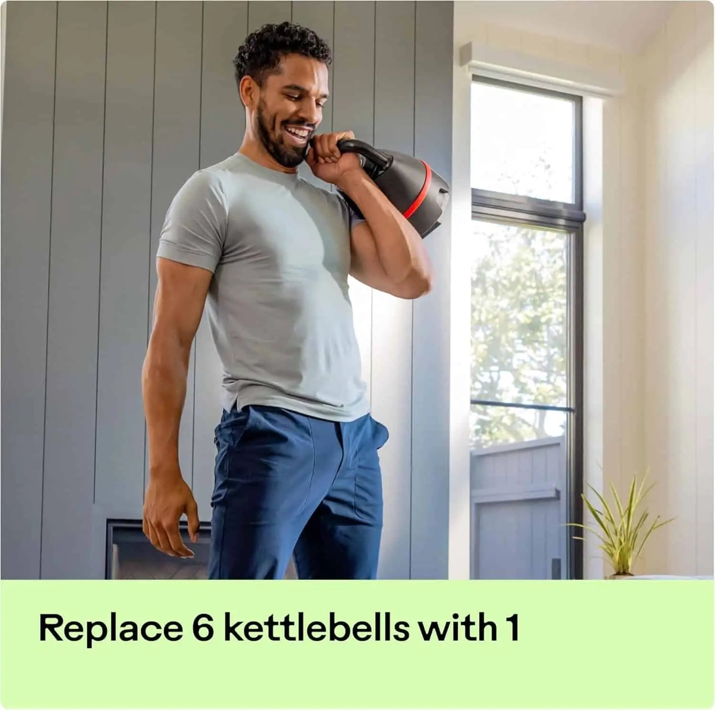Man lifting a large kettlebell indoors with text overlay