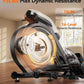 Exercise bike flywheel with dynamic resistance display on a wooden floor.