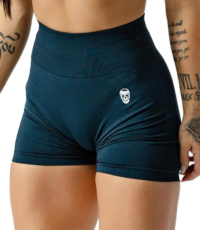 Teal athletic shorts with a small white logo on a plain background