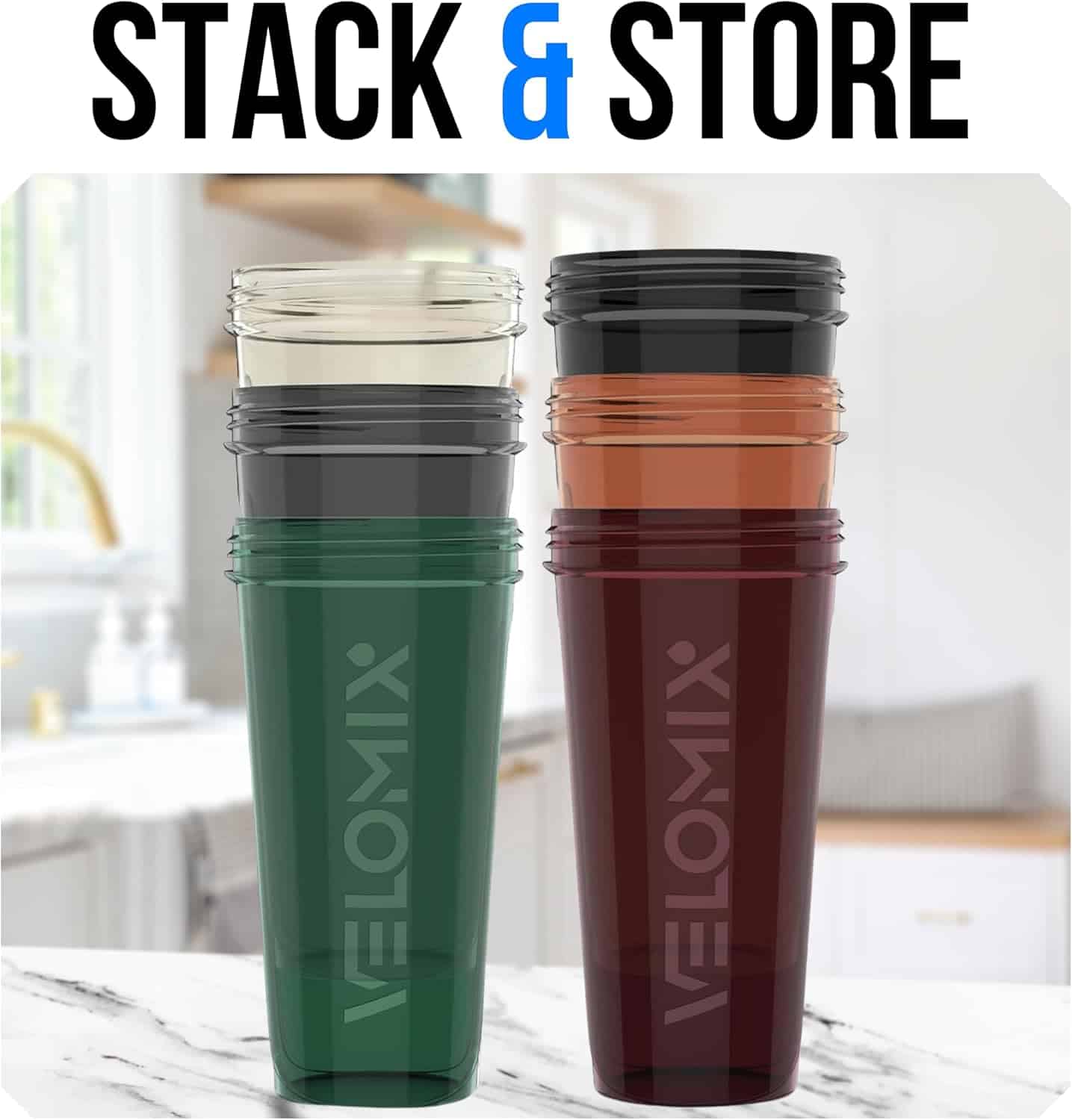 Two tumblers, one green and one brown, with 'VeloMix' branding on a marble surface.