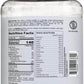 Back label of a protein powder container with nutrition facts and ingredients listed.