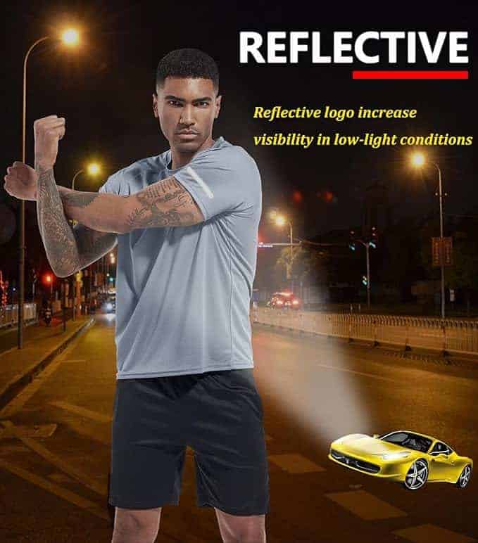 Person wearing reflective clothing on a street at night with text about reflective logos.