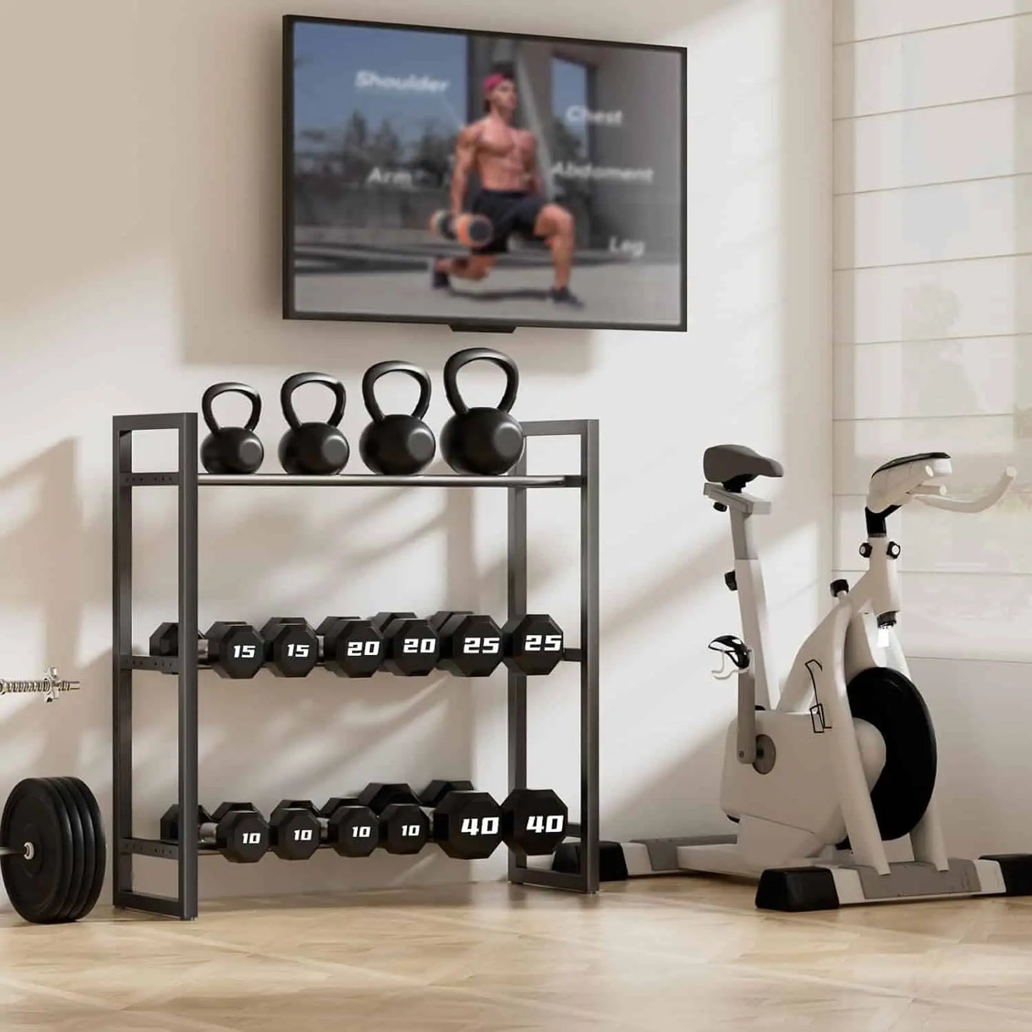 Home gym setup with kettlebells, dumbbells, and a stationary bike in front of a television displaying workout content.