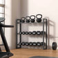 Weight rack with kettlebells and dumbbells in a home gym setting