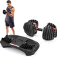 Adjustable dumbbells with weight plates and a stand on a white background