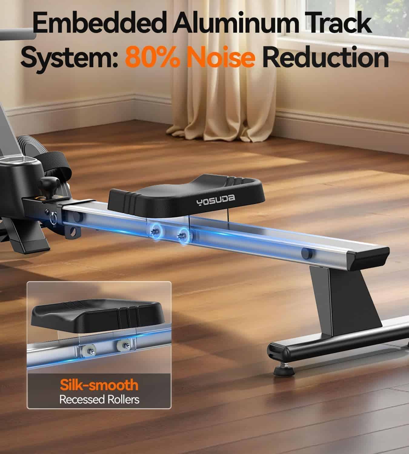 Yosuda rowing machine with embedded aluminum track system on a wooden floor.