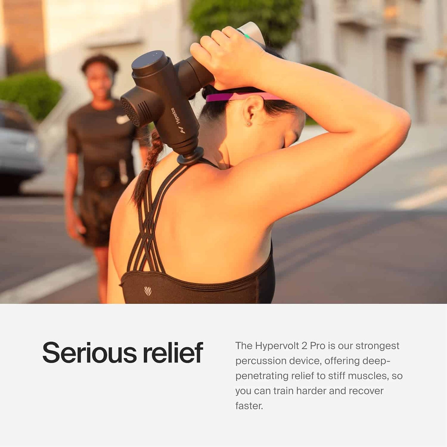 Person using a Hypervolt 2 Pro device outdoors with text about its benefits.