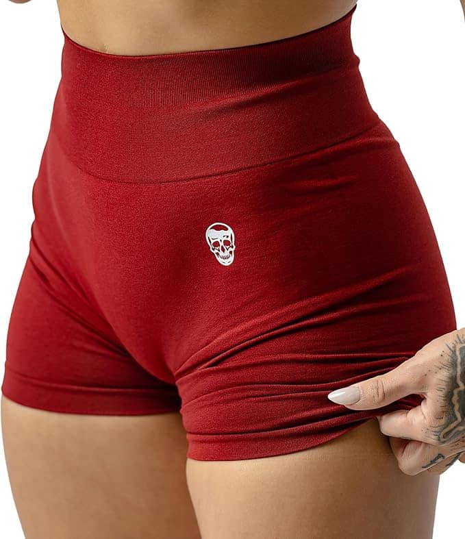 Red high-waisted shorts with a small logo on a white background