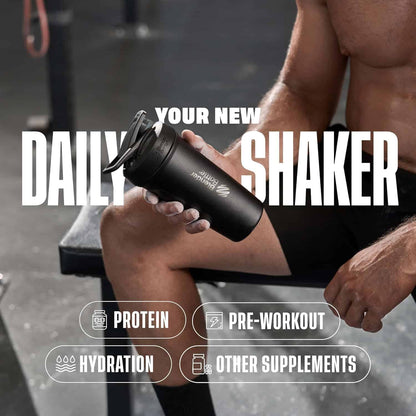 Person holding a black shaker bottle with text promoting its use for protein, pre-workout, hydration, and other supplements.
