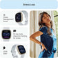 Smartwatch with stress management features and a woman relaxing indoors.