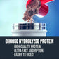 Red scoop pouring protein powder into a container with promotional text about hydrolyzed protein.