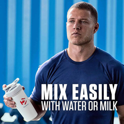 Man holding a white shaker bottle with text 'Mix Easily with Water or Milk' against a blue background