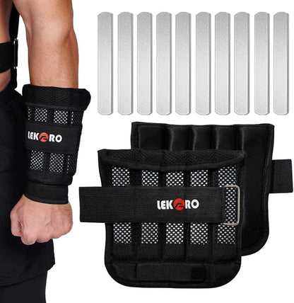 Black weightlifting straps with adjustable straps and weight plates on a white background