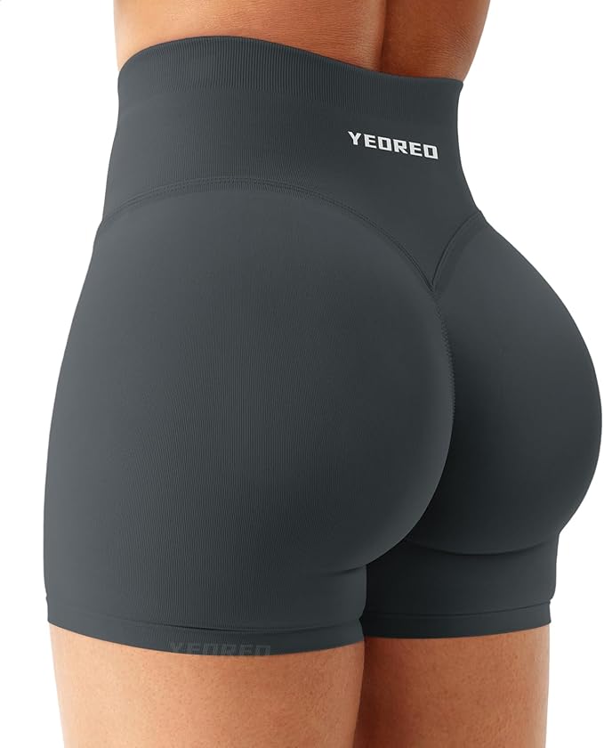 Black athletic shorts with YEOREO branding on a white background