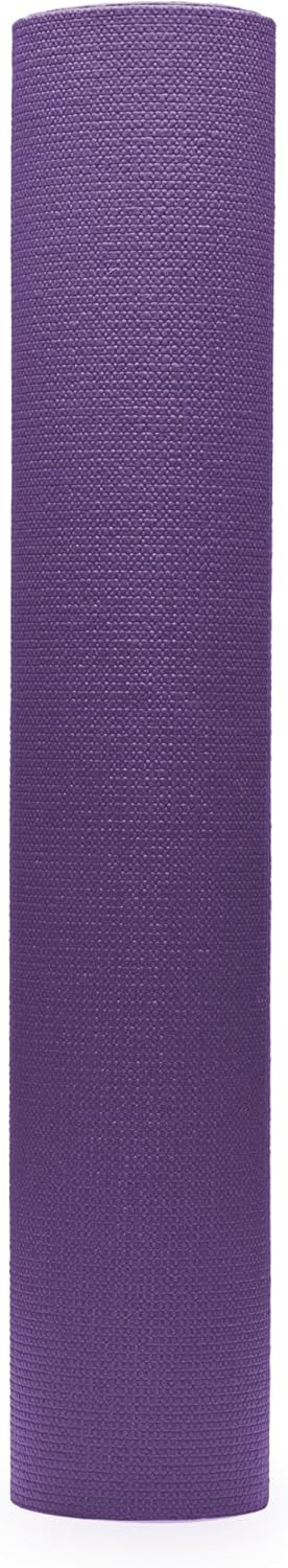 Purple yoga mat on a white background