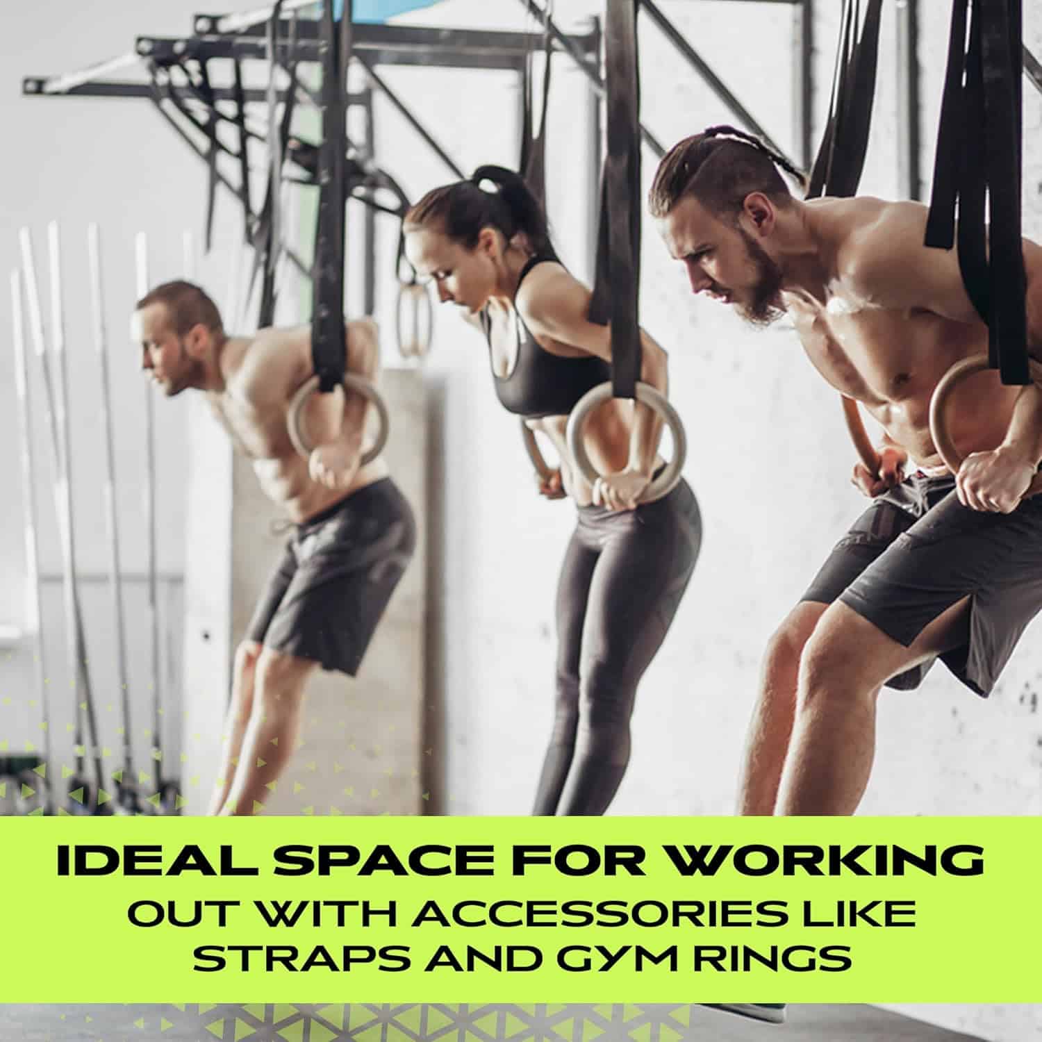 Three people exercising with straps and gym rings in a gym setting.