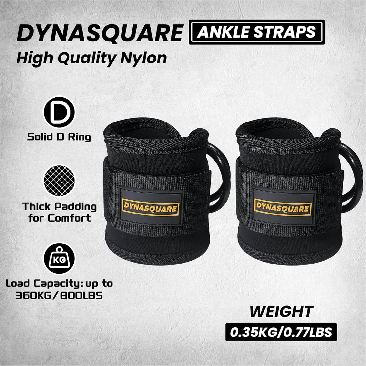Two black ankle straps with Dynasquare branding on a gray background.