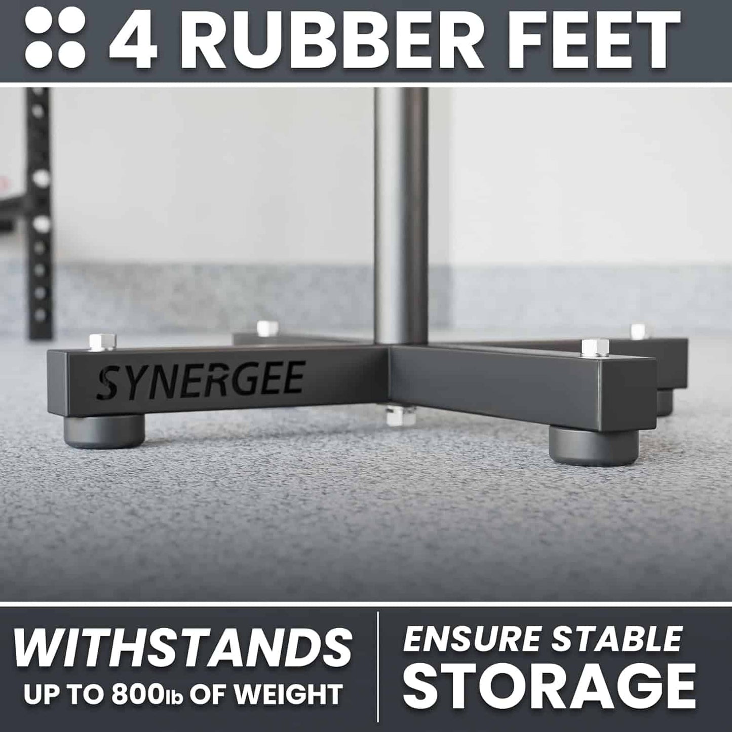 Black corner bracket with 'SYNERGEE' branding on a glass surface, featuring text about rubber feet and weight capacity.