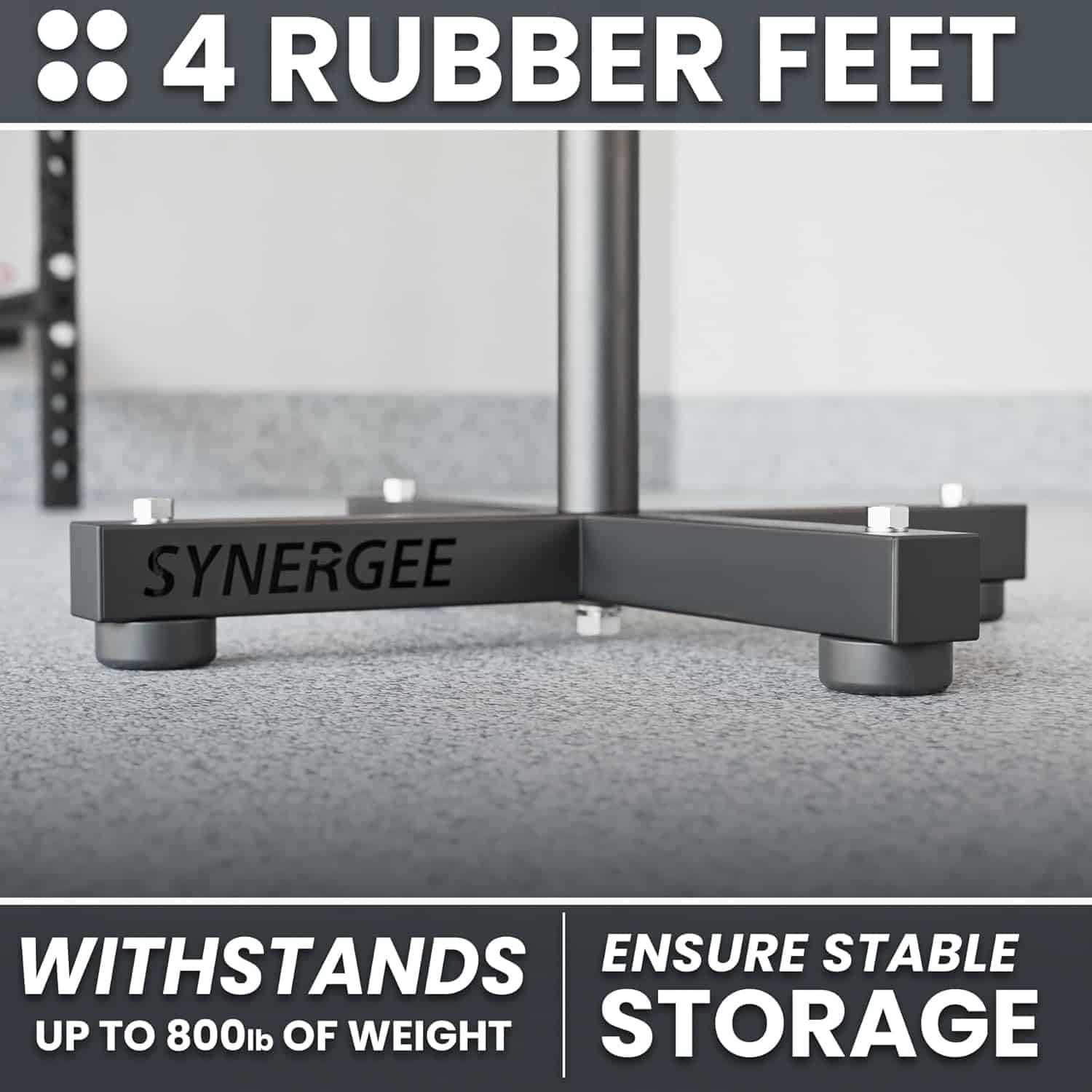 Black corner bracket with 'SYNERGEE' branding on a glass surface, featuring text about rubber feet and weight capacity.