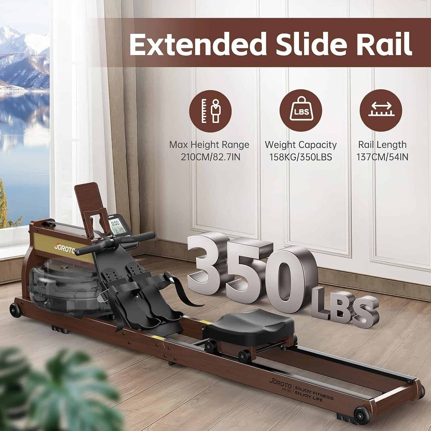 Rowing machine with extended slide rail in a room with a window view of mountains.