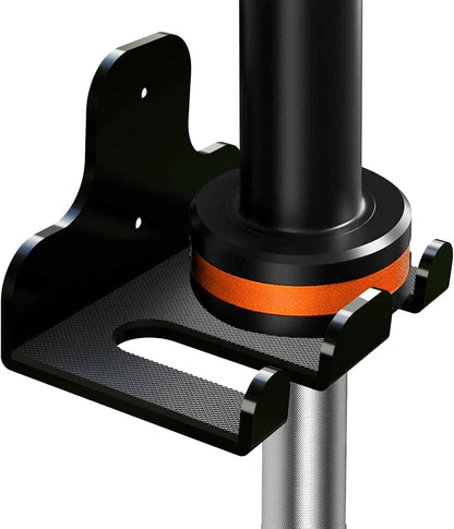 Close-up of a black and orange bike stand on a white background