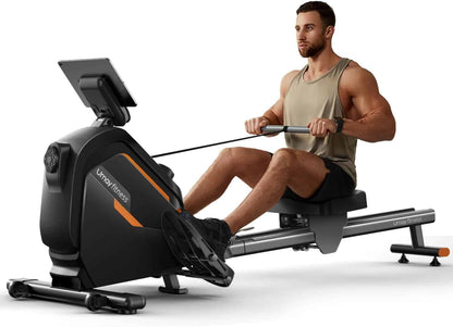 Man using a rowing machine on a white background