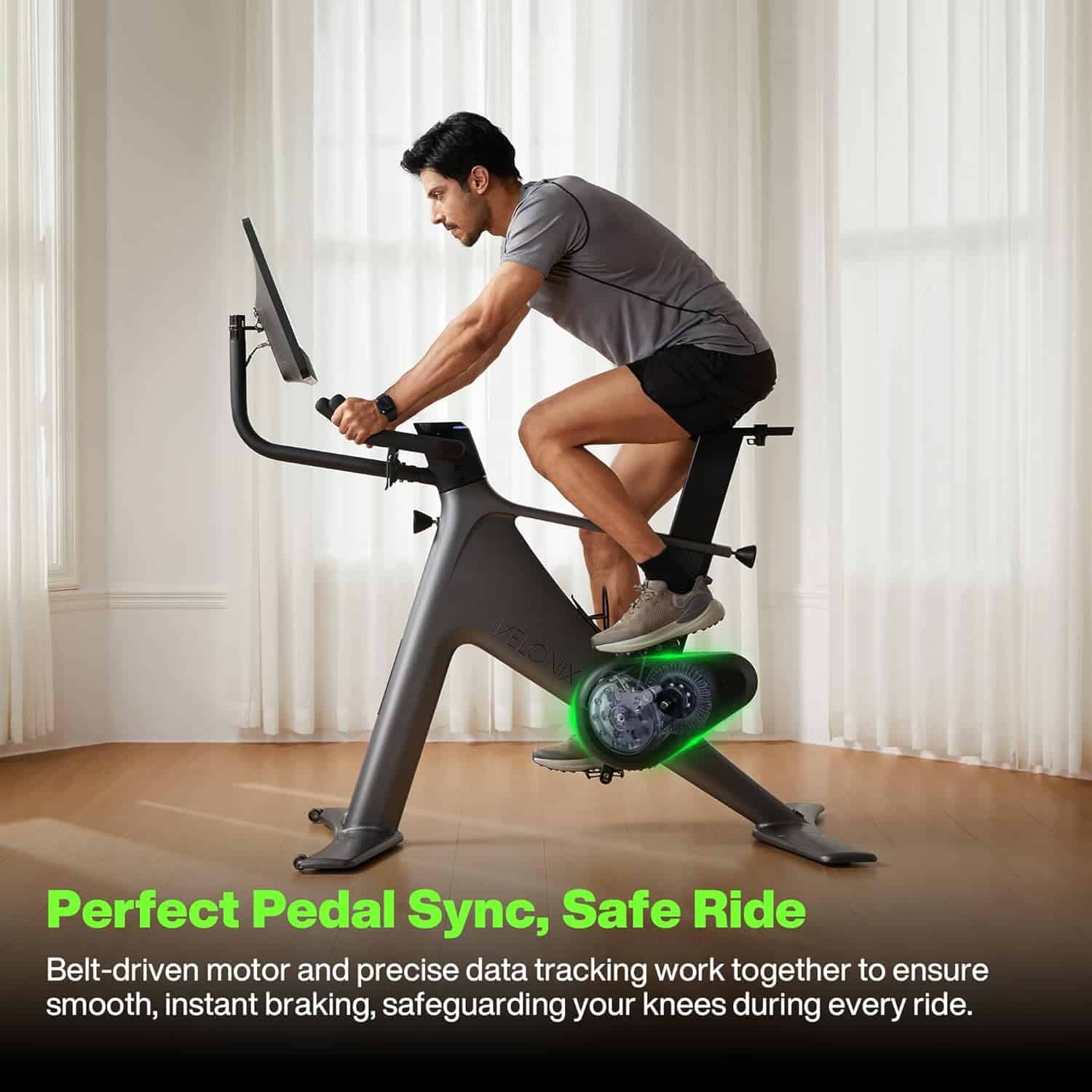 Person using a stationary bike with text about pedal sync and safety