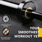 Black barbell with brass bushing on a dark background, featuring text about premium roller bearing and self-lubricating brass bushing.