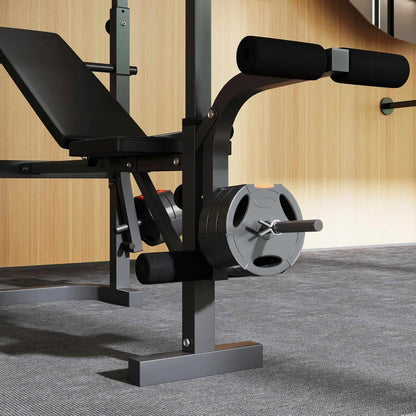 Weight bench with weight plates on a wooden floor.