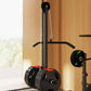 Home gym pulley system with weights on a blurred background