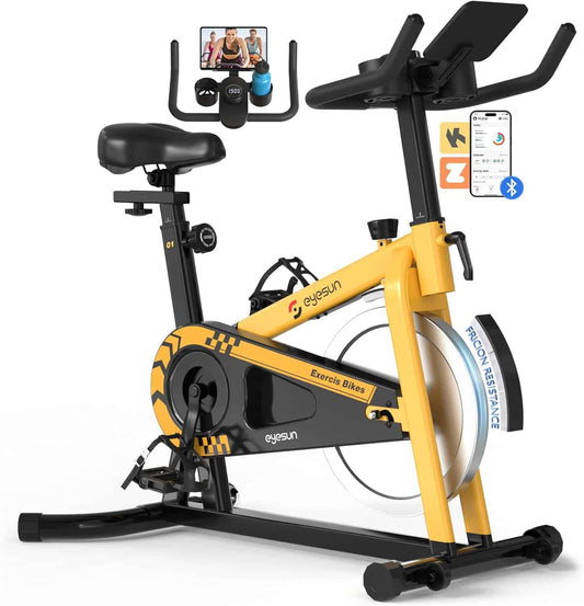 Yellow exercise bike with smartphone mount on a white background
